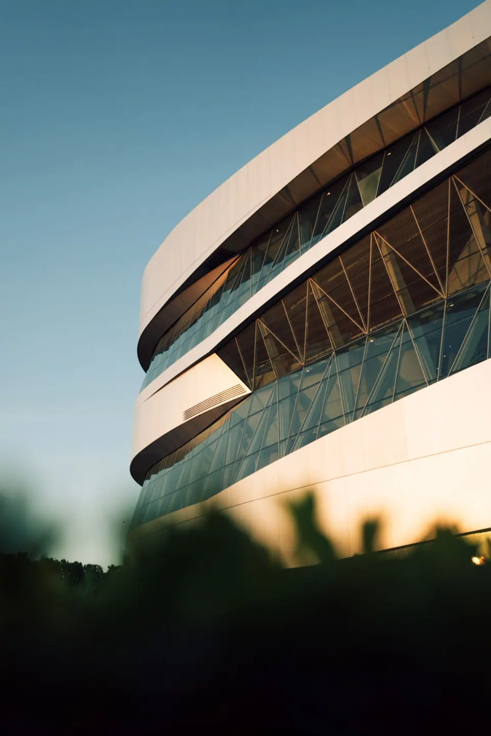 Mercedes-Benz Museum Stuttgart building at golden hour — private chauffeur museum tour